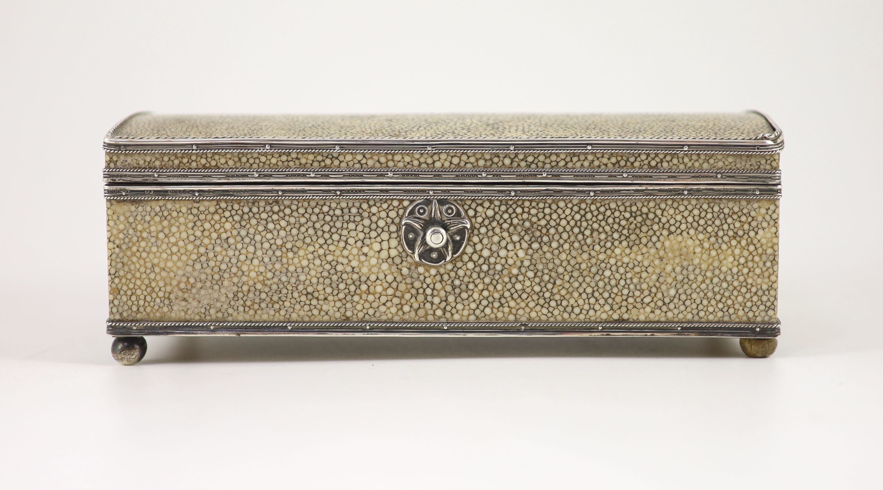 An Arts and Crafts silver mounted shagreen rectangular cigarette box, by John Paul Cooper